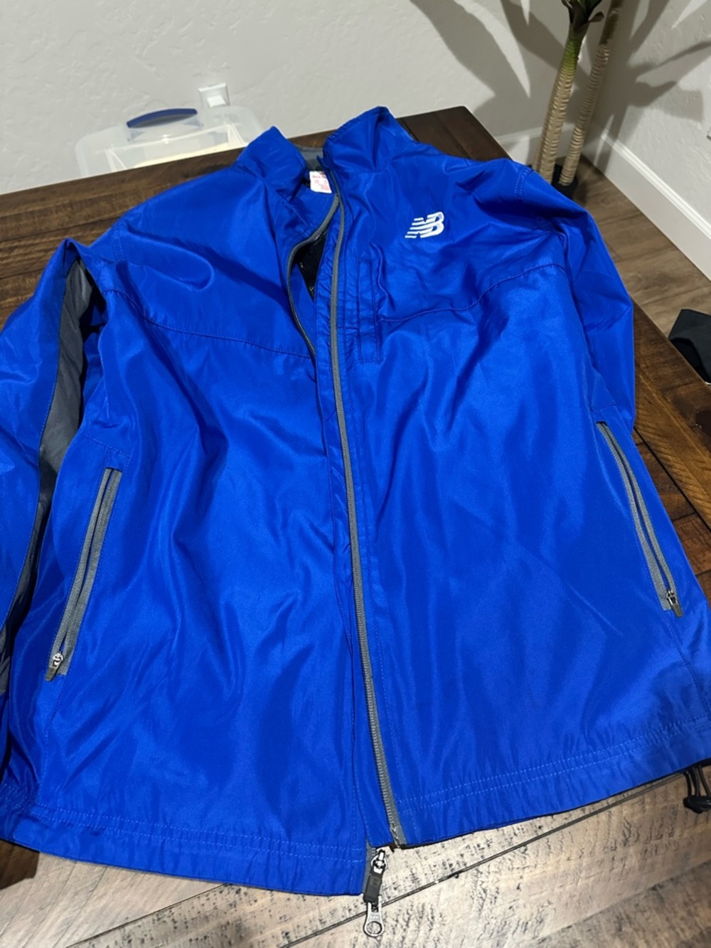 SOLD New Balance Men's Royal Blue Lightweight Jacket with Reflective Accents